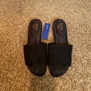 APT. 9 open toe black slides with a slight heal